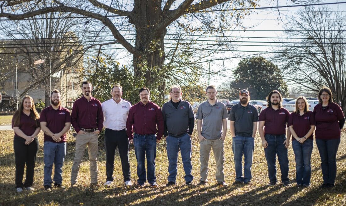 The Total BC team posing for a group photo.